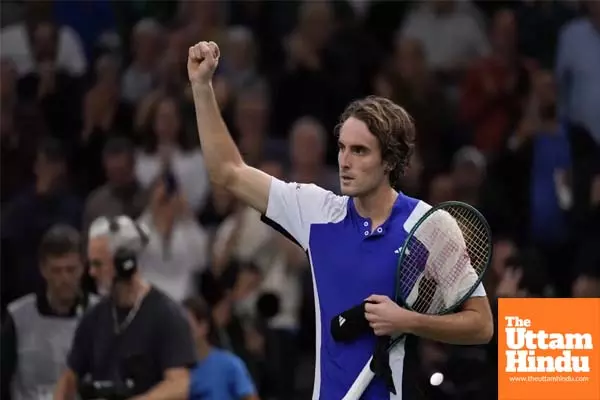 Tsitsipas overcomes stomach ache to win in Paris opener