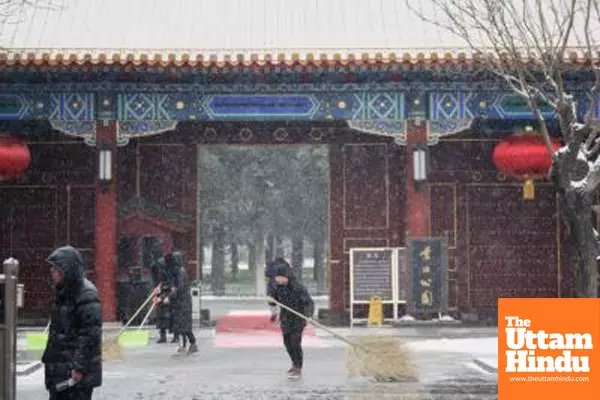 Beijing braces for cold wave, rain, snow