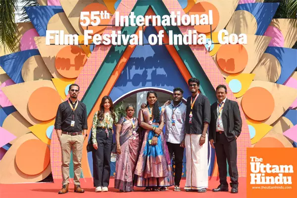 Panaji The team of the film Ammas Pride poses for photos on the red carpet at the 55th IFFI