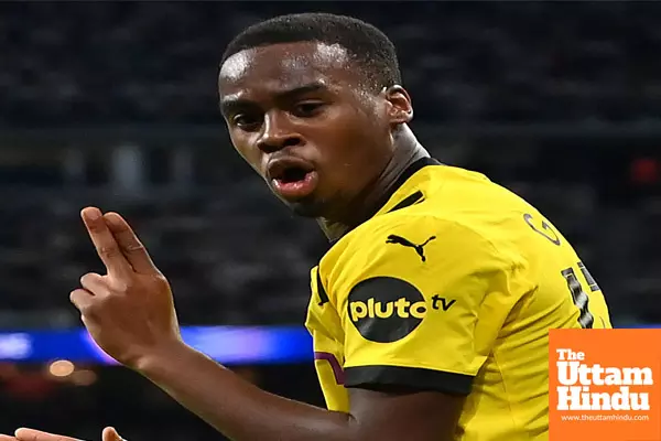 Dortmunds struggles lifted by courted youngster gittens in Champions League