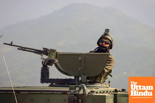 Imphal: Security personnel patrol in Armoured Tactical Vehicle at key locations on the periphery of Manipur