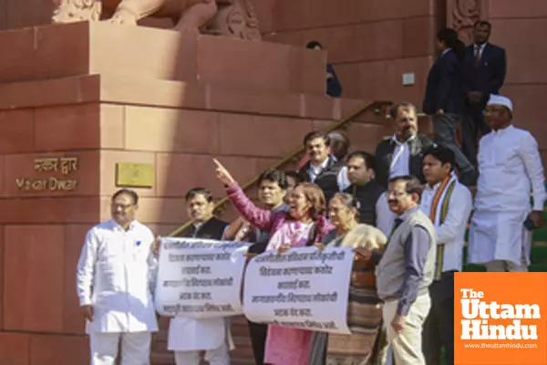 New Delhi: Congress MP Varsha Gaikwad and other MPs protest in the premises of Parliament over the alleged vandalising of a replica of the Indian Constitution in Maharashtras Parbhani