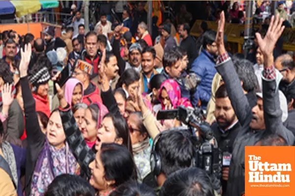 New Delhi : BJP and AAP workers sloganeer against each other at Connaught Places Hanuman Mandir