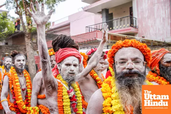 Prayagraj: Naga Sadhus of Mahanirvani Akhada take part in a religious procession