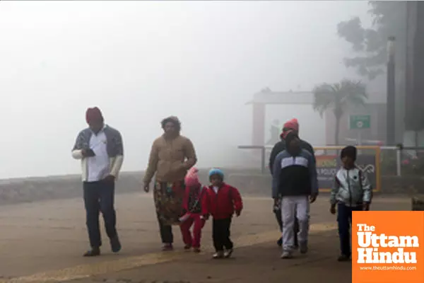 Chandigarh: Commuters walk through dense fog on a cold winter day