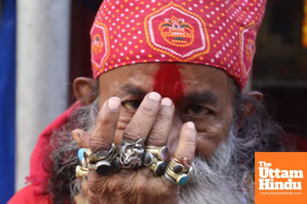 Kolkata: A sadhu applies tilak at the Babughat transit camp ahead of the Ganga Sagar Mela