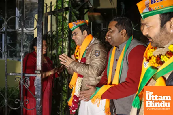 New Delhi: BJP candidate Ravinder Singh Negi conducts a door-to-door campaign ahead of the Delhi Assembly elections