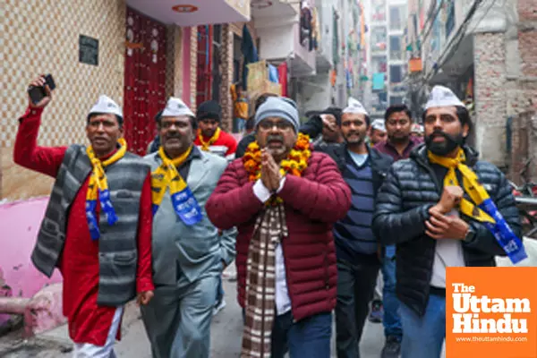 New Delhi: AAP candidate Awadh Ojha conducts door-to-door campaigning at Mandawali