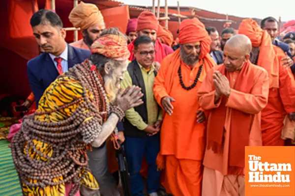 Prayagraj: Uttar Pradesh CM Yogi Adityanath interacts with sadhus