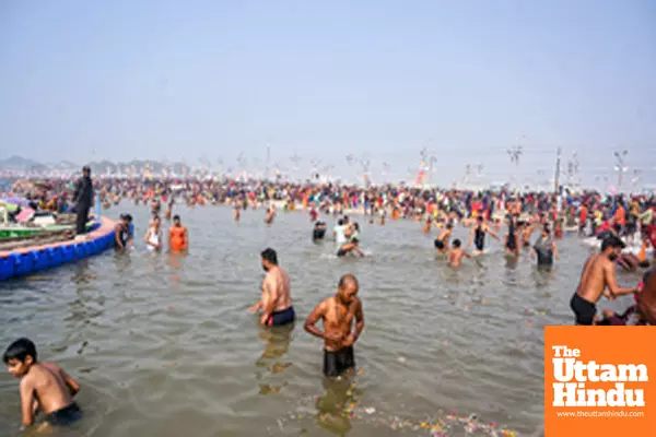 Prayagraj: Devotees take a holy dip in Sangam on a cold and foggy morning