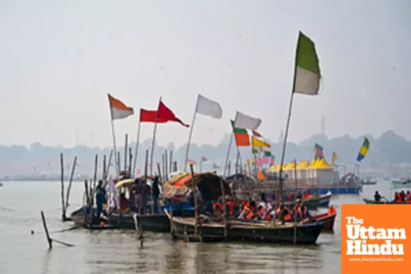 Prayagraj: Devotees take a boat ride at Sangam