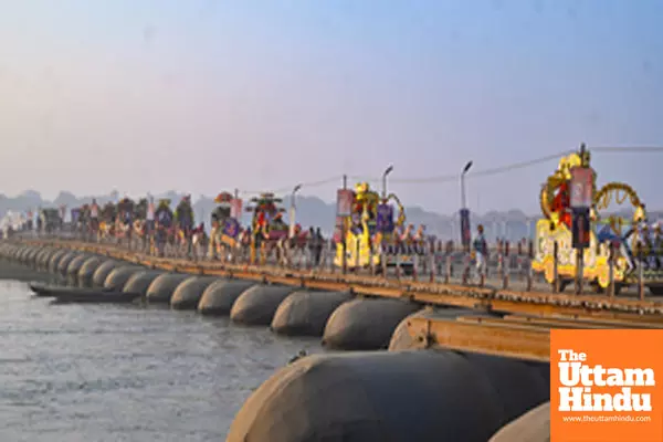 Prayagraj: Sadhus (holy men) take out a religious procession on a pontoon bridge towards the Sangam area