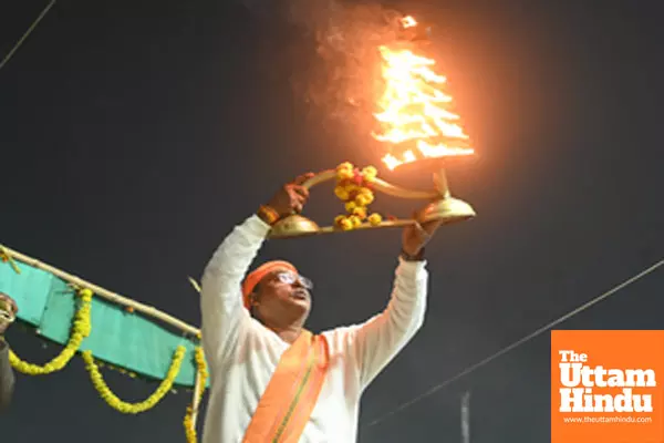 Prayagraj: A priest performs the sacred aarti on the banks of Sangam during the Maha Kumbh Mela 2025