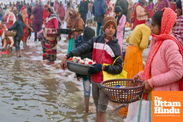 Prayagraj: Vendors sell sacred offerings at the bank of the Sangam