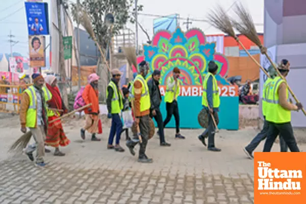 Prayagraj: Workers walk towards the Sangam ahead of Maha Kumbh Mela 2025,