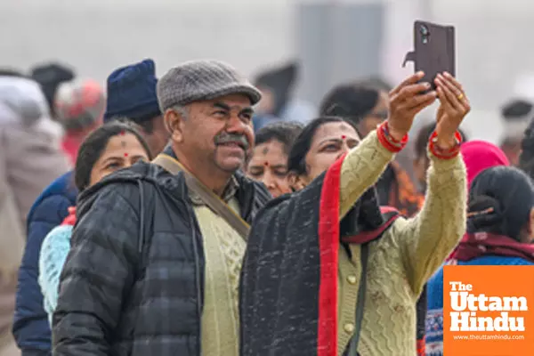 Prayagraj: People take a selfie at Sangam