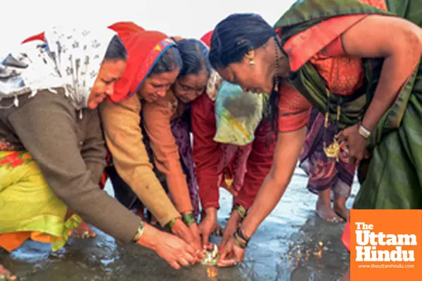 South 24 Parganas: Female devotees perform rituals at Gangasagar Island on a winter morning