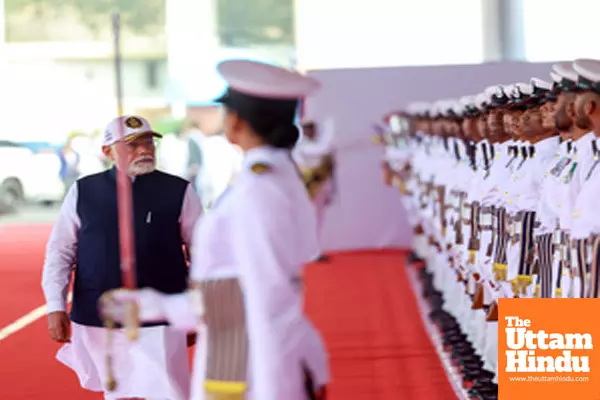 Mumbai: PM Narendra Modi inspects the Guard of Honour at the Naval Dockyard