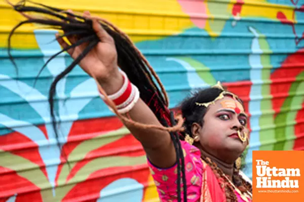 Prayagraj: A Member of the Kinnar Akhada poses for photo at the Triveni Sangam,