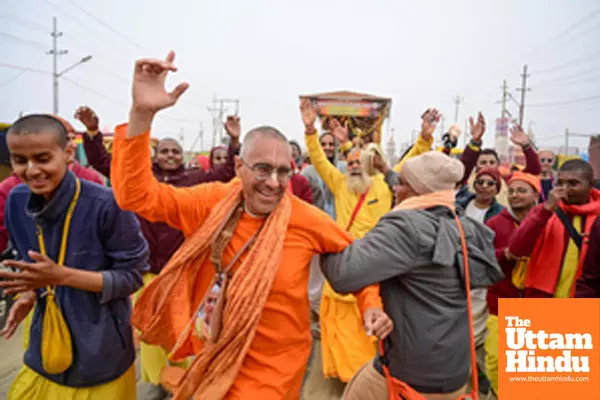 Prayagraj: Iskon devotees dances as they participate in the Shobha Yatra