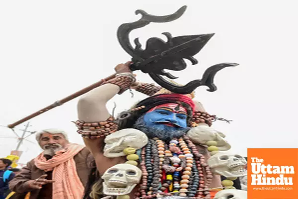 Prayagraj: A Sadhu dressed as lord Shiva performs at the Triveni Sangam