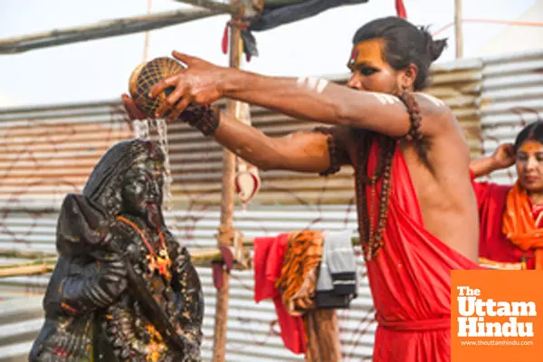 Prayagraj: A sadhu performs a ritual and offers prayers to Maa Kali during the Maha Kumbh Mela 2025