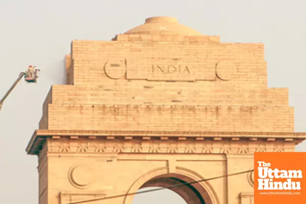 New Delhi: Delhi Fire Service personnel clean the India Gate as part of preparations for Republic Day 2025