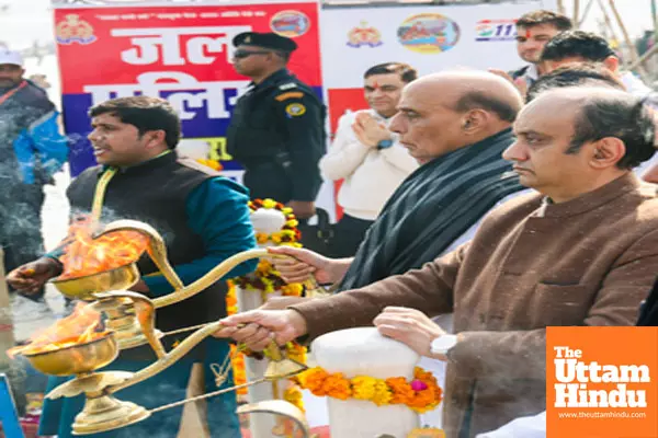 Prayagraj: Defence Minister Rajnath Singh and BJP Rajya Sabha MP Sudhanshu Trivedi perform the Ganga Aarti at the Triveni Sangam