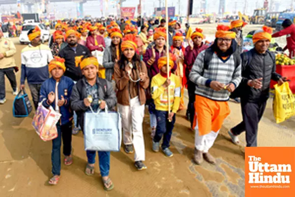 Prayagraj: Devotees take part in a religious procession at the Triveni Sangam