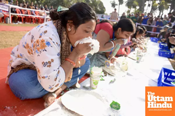 Patna: Participants take part in the “Dahi Khao” curd-eating competition