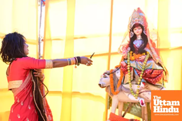 Prayagraj: A kinnar sadhu offers prayers during the Maha Kumbh Mela 2025 at the Sangam