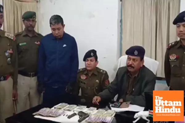 Bangladeshi held in Tripura with gun, smartphones, currencies of 2 nations