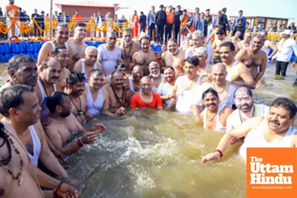 Prayagraj: Uttar Pradesh Chief Minister Yogi Adityanath offers prayer at Triveni Sangam with cabinet ministers