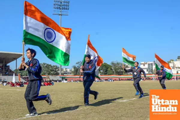 Amritsar: Students rehearse with the Indian national flag for the Republic Day celebrations