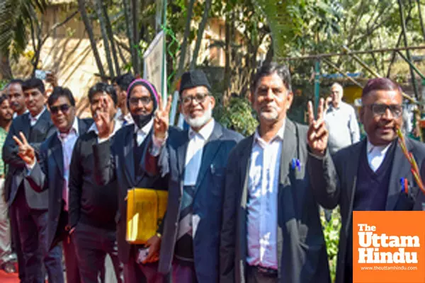 Ranchi: Advocates show victory signs after casting their votes during the Jharkhand State Bar Council Elections