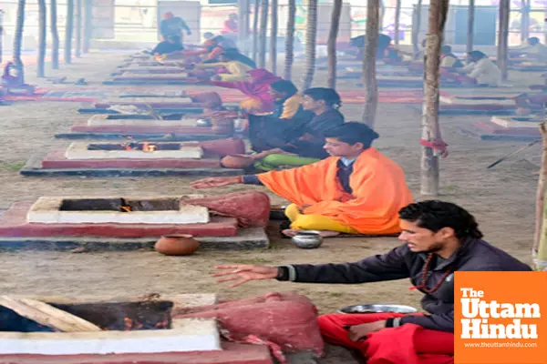 Prayagraj: Sadhus (holy men) perform Havan at Triveni Sangam