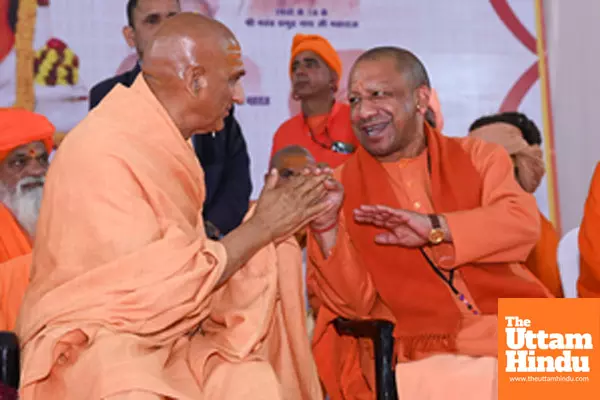 Prayagraj: Uttar Pradesh Chief Minister Yogi Adityanath with Acharya Mahamandaleshwar Swami Avdheshanand Giri Maharaj of Juna Akhara