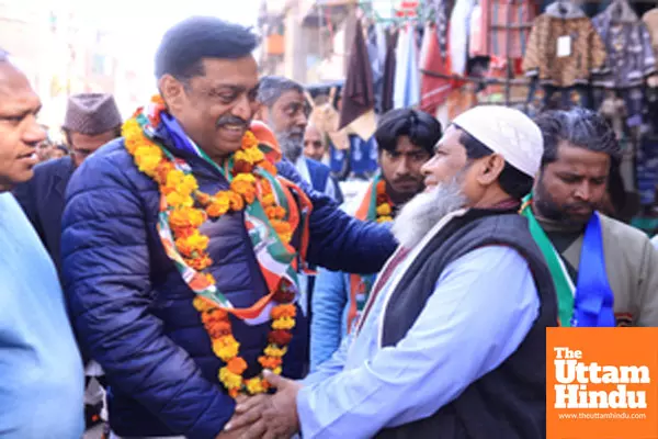 New Delhi: Congress candidate from Seemapuri assembly constituency, Rajesh Lilothia, campaigns