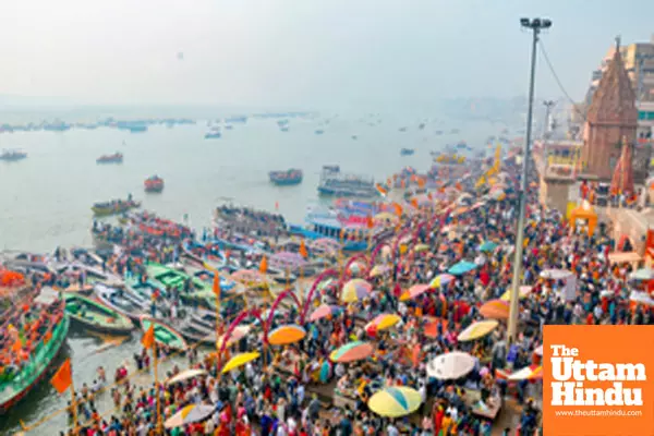 Varanasi: Large number of devotees take a holy dip in the Ganga on the occasion of Mauni Amavasya