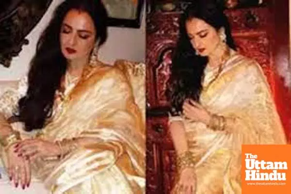 Rekha exudes grace in hand woven gold tissue stripe saree