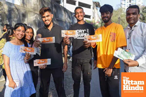 Nagpur: Cricket fans display their tickets for the upcoming ODI match between India and England