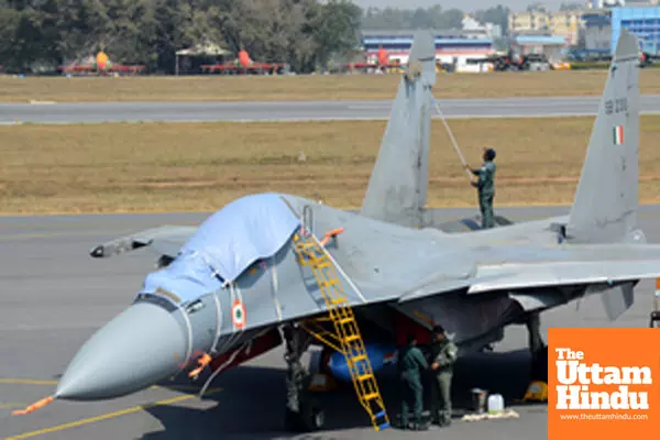 Fighter jets and other aircraft at the static display area at Yelahanka Air Force Station on the eve of Aero India 2025