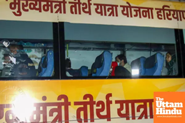 A bus carrying deported Indians from the US leaves the airport