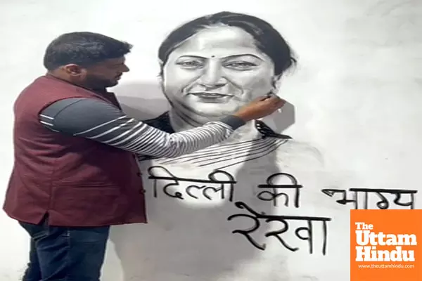 An artist creates a portrait of Delhi CM-designate Rekha Gupta