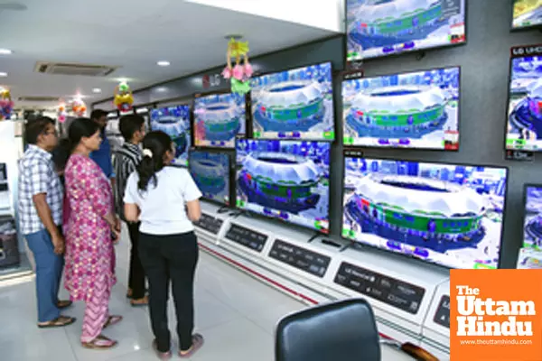 Cricket fans gather to watch the live telecast of the India vs Pakistan match