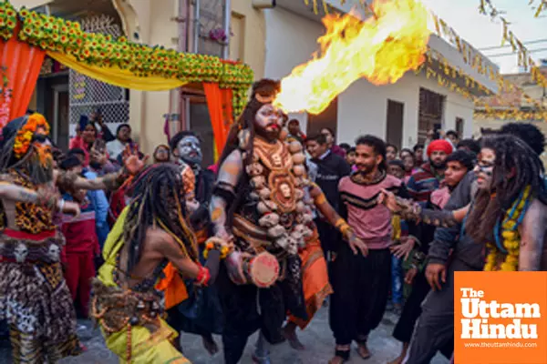 A devotee dressed as Lord Shiva participates in a religious procession on the eve of the Maha Shivratri festival