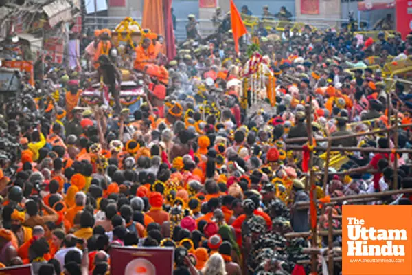 Naga sadhus and holy men take part in a procession towards Kashi Vishwanath Temple