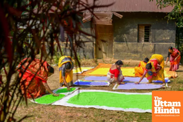 Women prepare herbal colours ahead of Holi