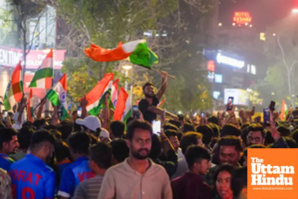 Cricket fans celebrate after India won the ICC Champions Trophy final against New Zealand played at Dubai