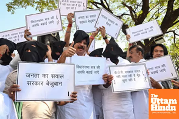 Congress legislators protest at the Gandhi statue